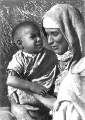 Алжирская женщина с ребёнком.