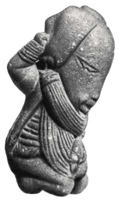 Коленопреклоненная фигурка из Абуджи.